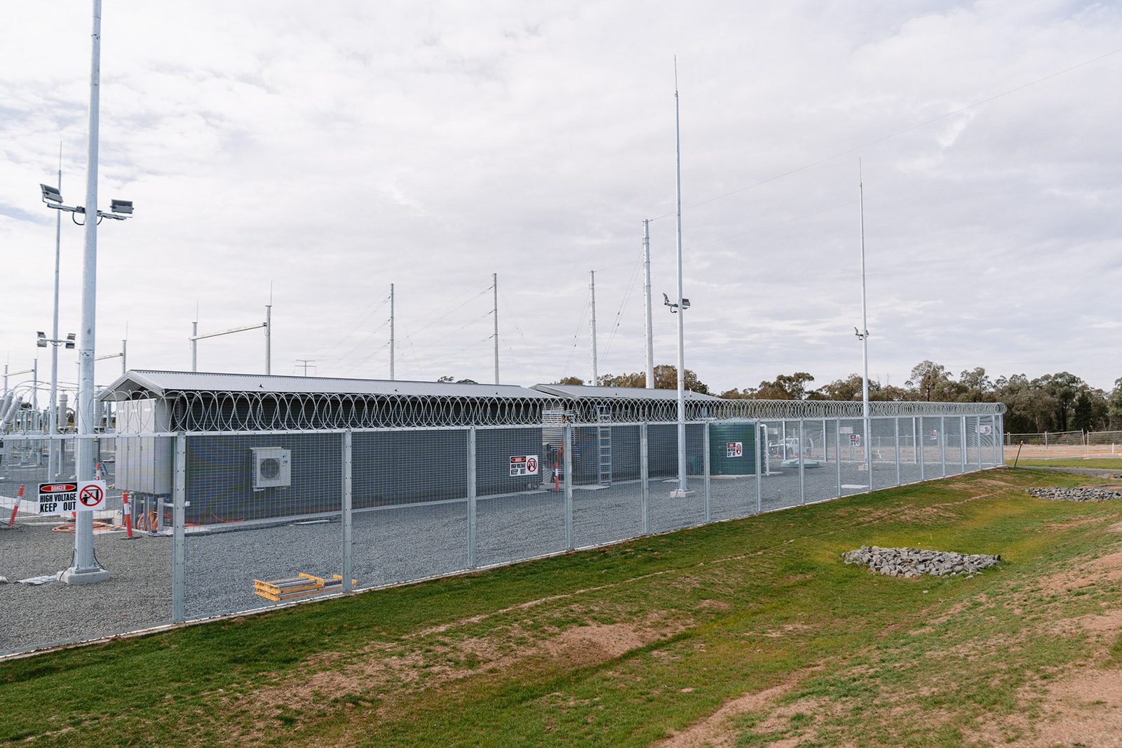 LS Fencing: high security compound fence and building